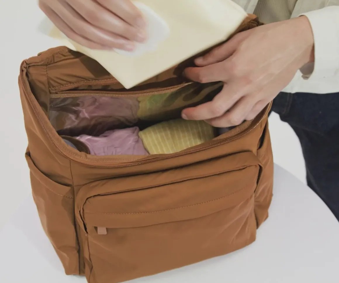 Featherlight Diaper Backpack in Amaro Brown