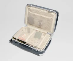 The Aluminum Edge Bigger Carry-On in Navy Blue