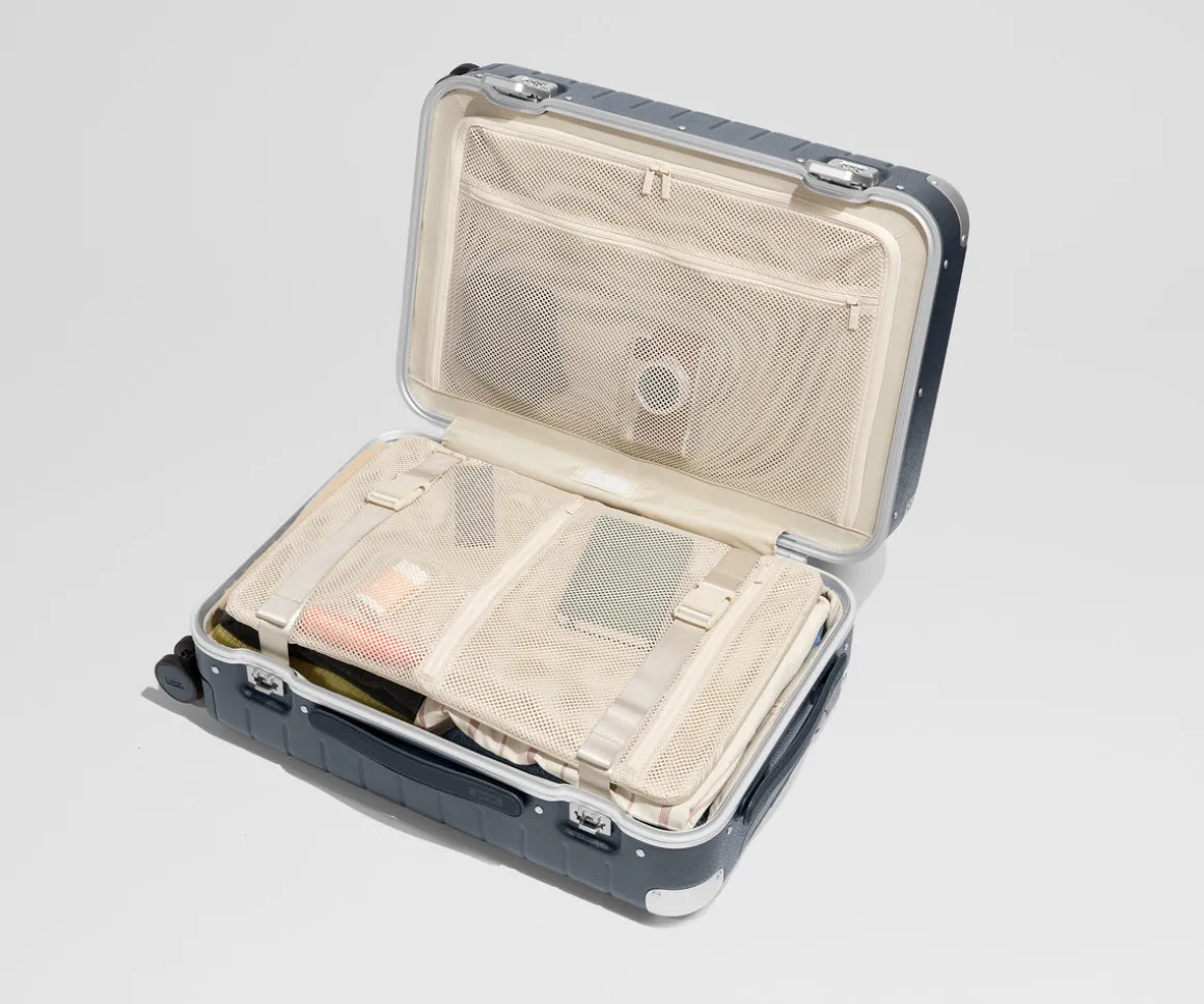 The Aluminum Edge Bigger Carry-On in Navy Blue
