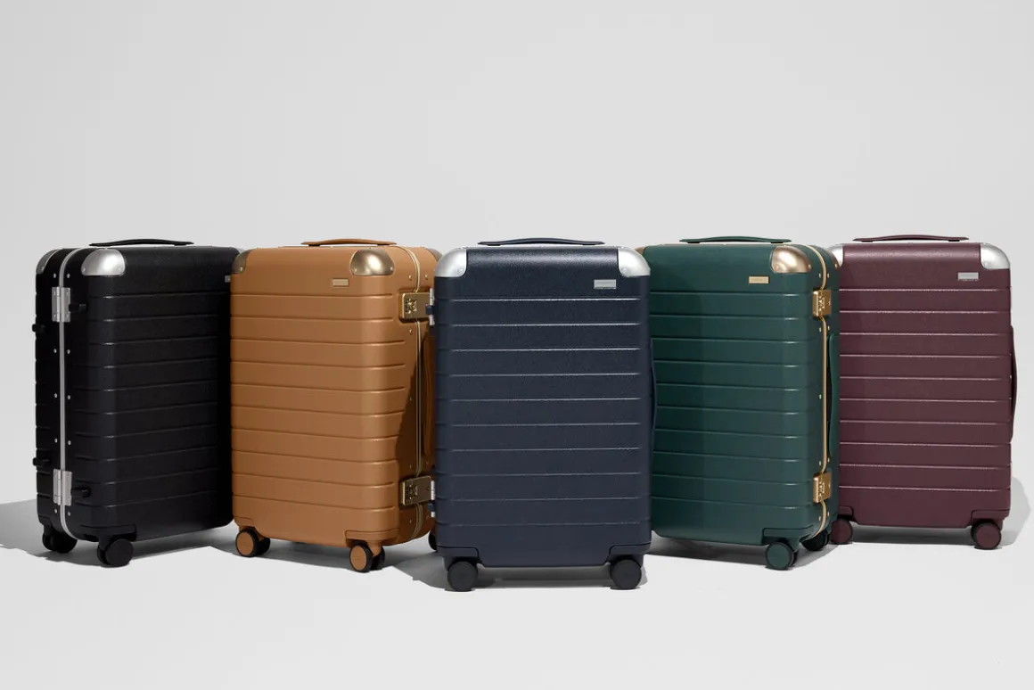 The Aluminum Edge Bigger Carry-On in Navy Blue