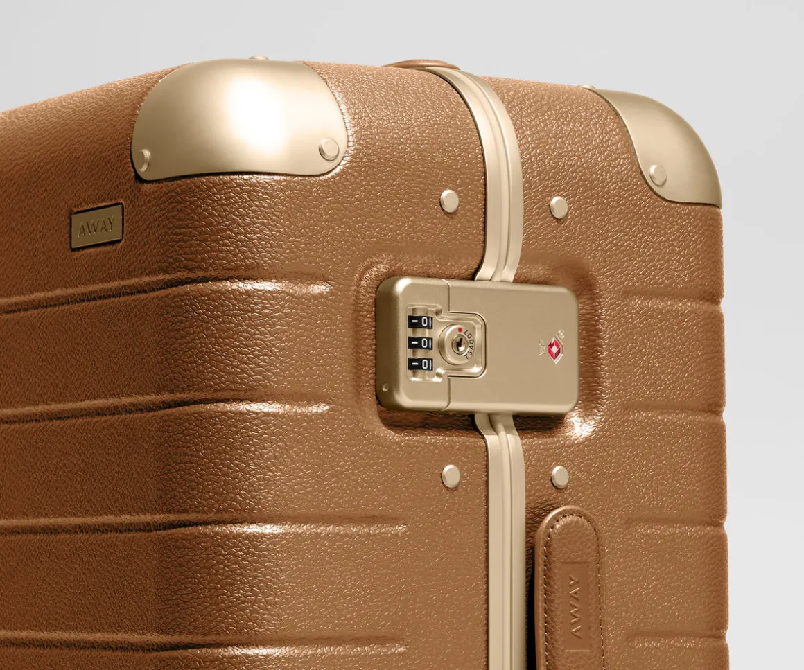 The Aluminum Edge Bigger Carry-On in Cognac Brown