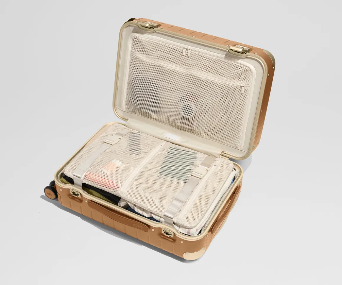 The Aluminum Edge Bigger Carry-On in Cognac Brown