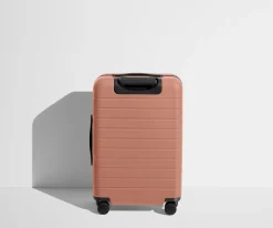 The Bigger Carry-On Flex in Clay Pink