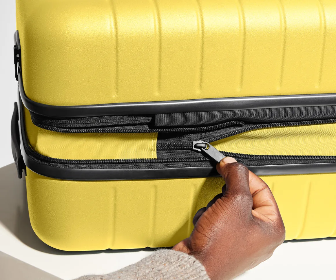 The Bigger Carry-On Flex in Sunshine Yellow