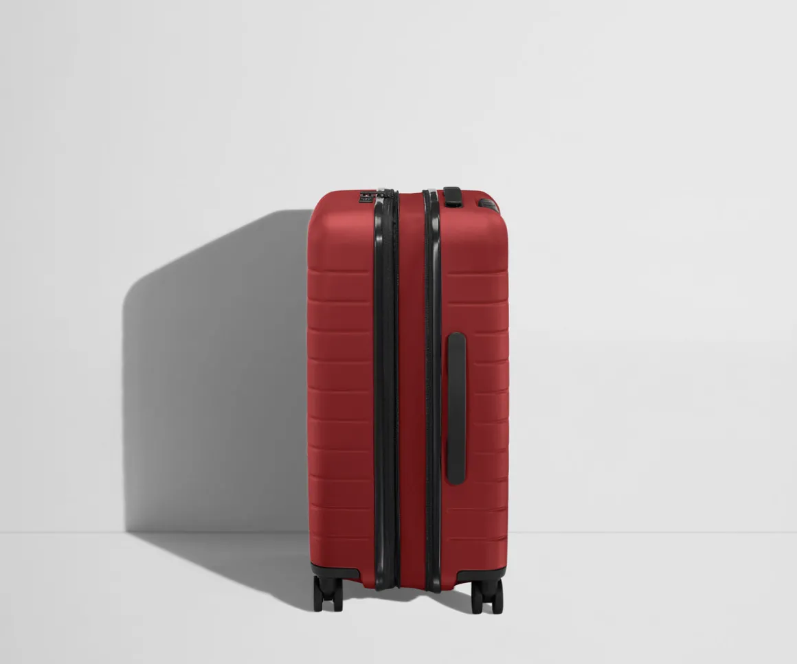 The Bigger Carry-On Flex in Tango Red