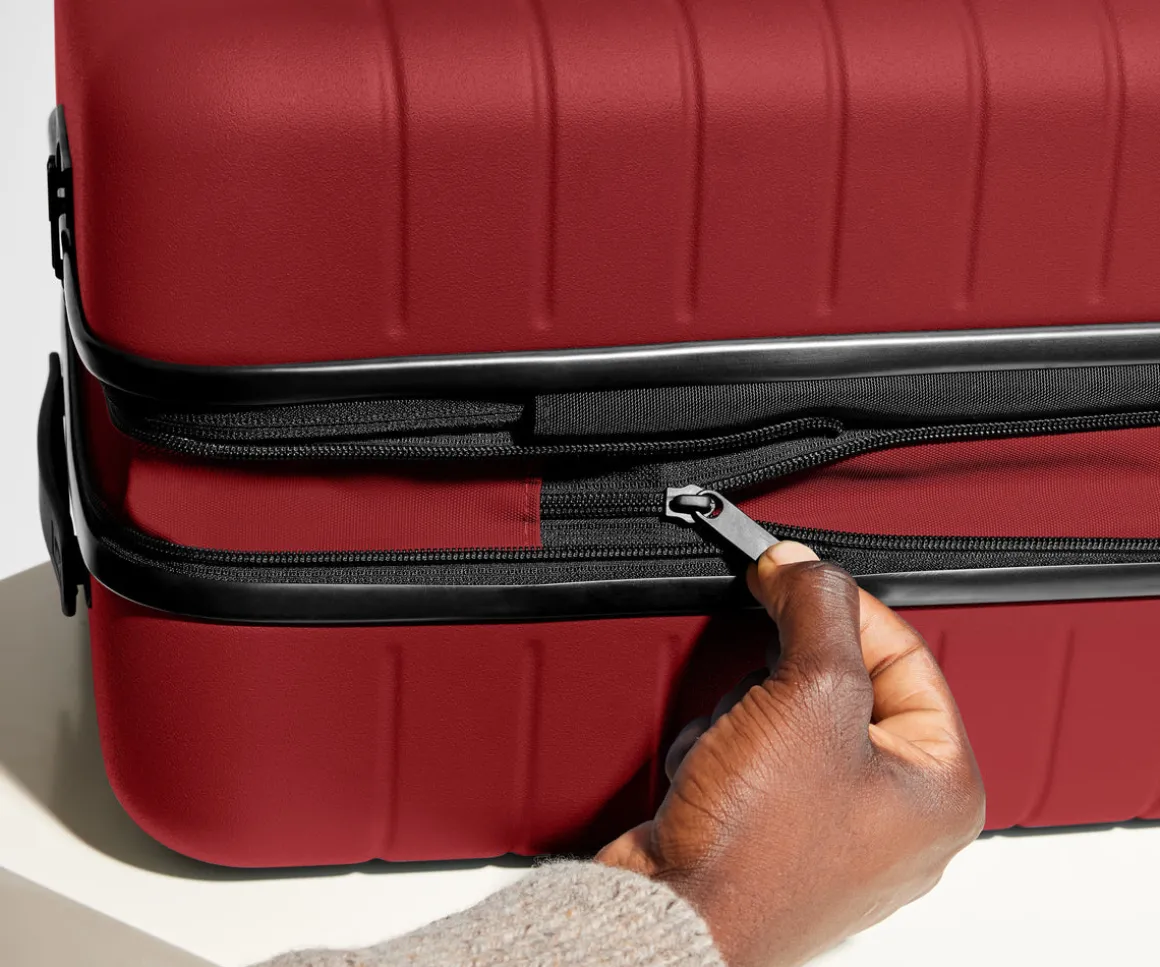 The Bigger Carry-On Flex in Tango Red