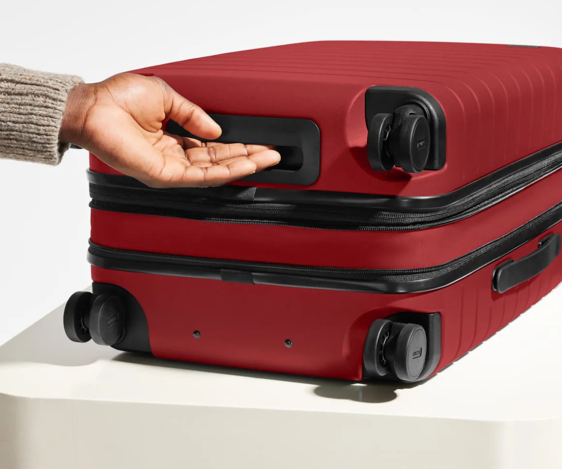 The Bigger Carry-On Flex in Tango Red