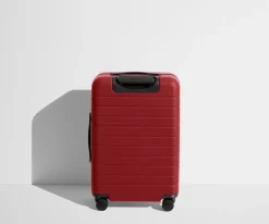 The Bigger Carry-On Flex in Tango Red